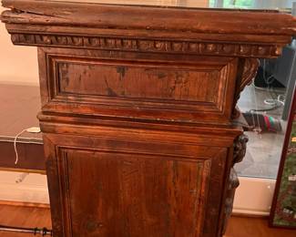 M105 - $650. Antique Renaissance Style Carved Walnut (?) 2 piece cabinet. Top & Base Move separately. Measures 38.5" x 15" deep x 46" tall. Hardware is all handmade - primitive. 