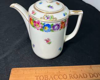 M60 - $150. Schumann Bavaria Empress Dresden Flowers Hand Painted. 1 coffee pot. 1 tea pot. 1 cream & sugar. 6 Tea cups. 6 saucers. 15 pieces. All appear to be in very good vintage/ antique condition!