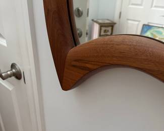 K69 - $150. Vintage Asymmetrical Wood Framed Mirror. Measures 18" wide x 37" tall. Wood frame is in excellent condition - mirror shows a bit of wear along the edge. 