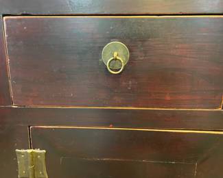 M48 - $450. Two Door, Two Drawer Red Asian Chest. Measures 41" wide x 25.5" deep x 35.75" tall. 
