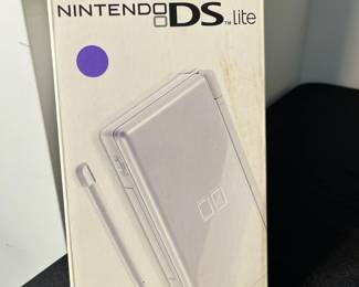 M133 - $60. Nintendo DS lite. Looks like its never been out of the box. 