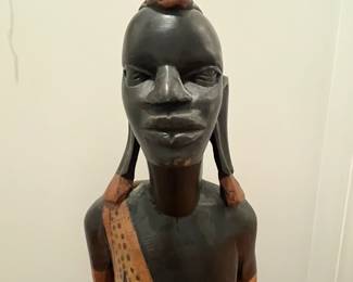 K23 - $50. Hand Carved in Kenya Statue. Measures 6.5" wide x 36.26" tall. (He was holding a sword originally but that has broken off at some point.)