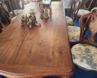 Dining room table with 12 chairs.  