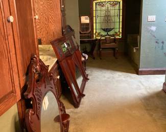 Beautiful mirrors and the stained glass window is for sale also.