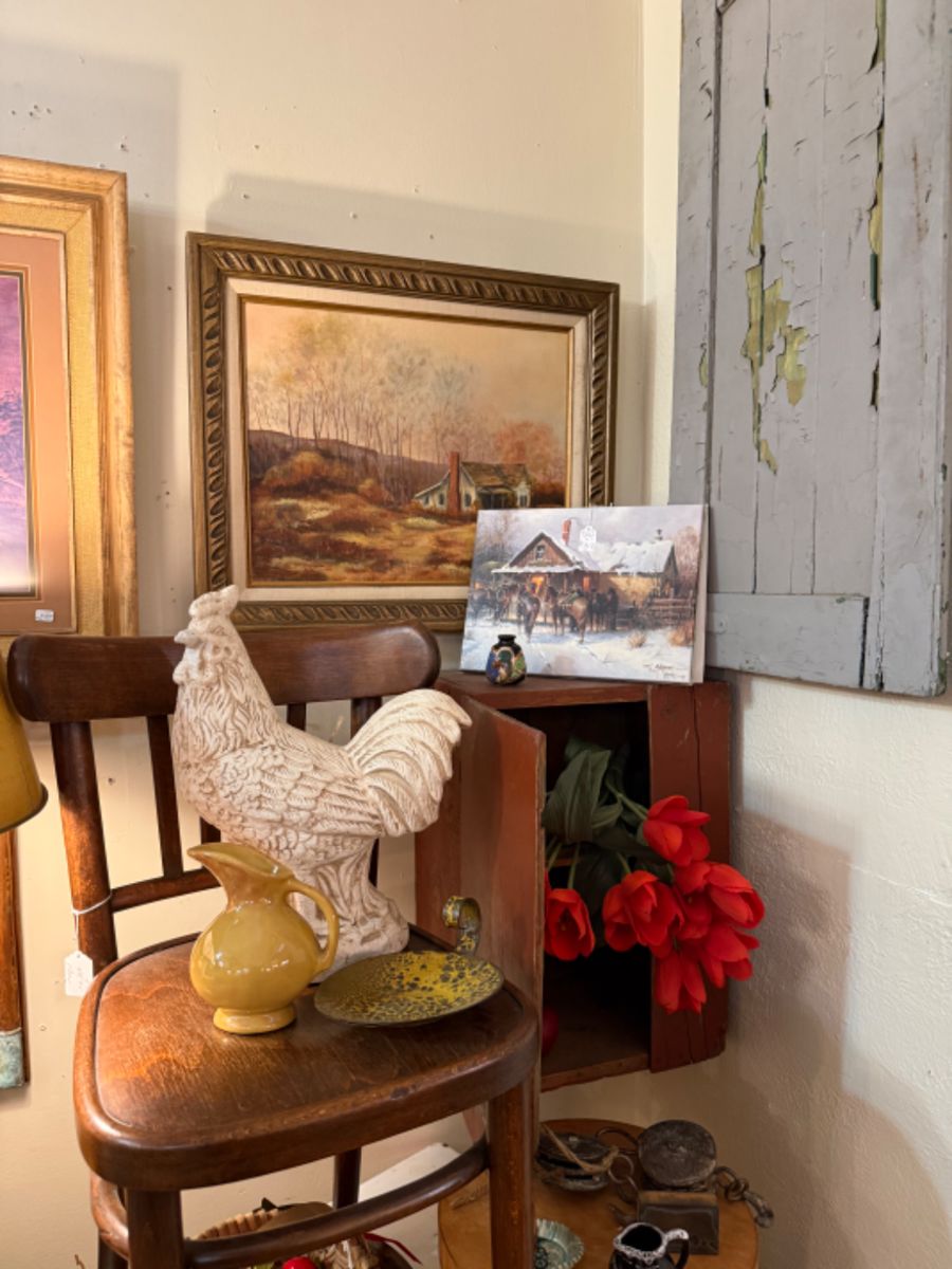 Rooster statue, end tables (solid wood), framed art, florals.