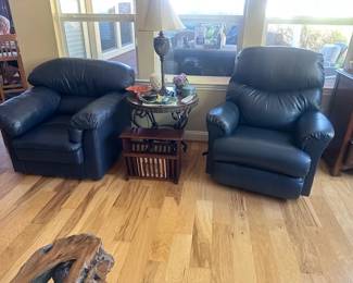 Dark blue leather chairs, 1 is a recliner, Both are very comfortable