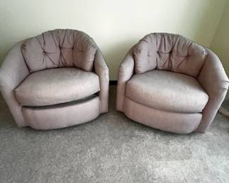 Rock and swivel comfy low back chairs! 2 Pink matching chairs. Gently used!