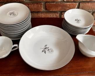Dinnerware China set-Floral center design. 14 desert plates; 8 saucers; 1 creamer bowl; 1 coffee cup, 1 serving bowl