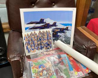 office chair, posters, cheerleaders photo, Wonder Woman, magazines, etc.