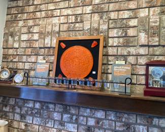 glass Incan calendar, 2 "Oilwell Fishing Operations" books, clocks