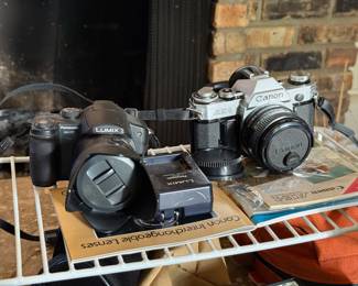 Panasonic Lumix DMC-F27 Digital Camera and Canon AE-1 Film Camera w/ 50mm 1.8 Lens.
