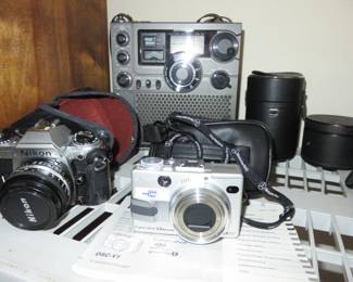 Sony ICF-5900 FM/AM Multi Band Wave Radio, Nikon 35mm Camera, Sony DSC-V1
