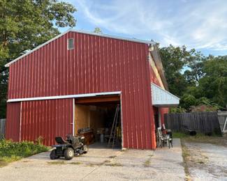 Huge 2 level Pole barn is packed.