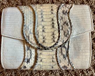 71. Khirma New York Python Clutch