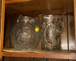 TWO GLASS PITCHERS