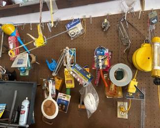 ITEMS HANGING ON PEG BOARD