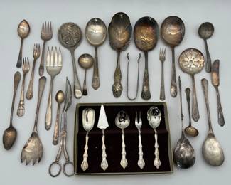 57 SilverplateUtensilsLotFeaturingManyServingPieces