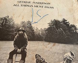 George Harrison's first album after the Beatles separation. Vinyl is good. Dust cover shows water damage.