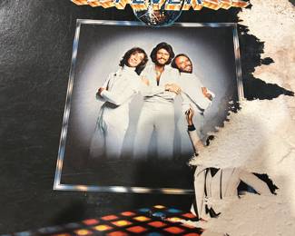 Over 100 vinyl 33 lps from late 60's to early 70's. Named and titles you would recognize. Most vinyls are in good condition, but dust jackets show signs of water damage. They have been in the attic.
