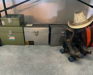 Vintage storage boxes, vintage roller skates, and a Vintage bowling bag with bowling ball and shoes