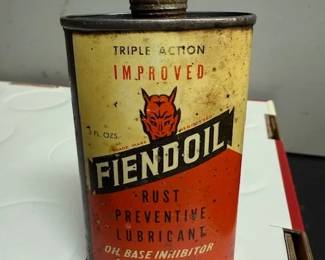 Tons of old advertising oil cans. 