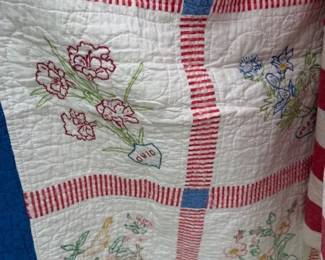 Hand stitched state flower quilts. 