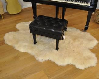 Adjustable leather piano stool by Paul Jansen