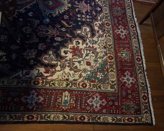 Antique rug (partial photo)