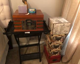 storage boxes, record player, CD player