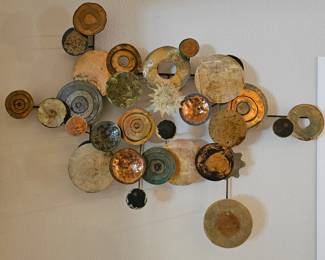 "Parhelia" abstract metal wall sculpture by Hollack