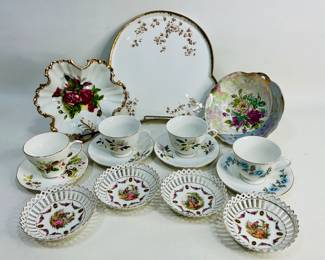 Fine China Tray, Bowls, And Teacups With Saucers. This lot includes four 5" German reticulated lattice bowls, a classic Haviland Limoges GDM porcelain serving tray, two decorative bowls, and four fine china teacup and saucer sets. Shipping-NO