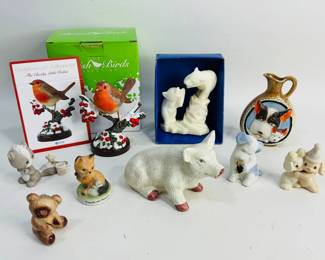 Vintage animal figurines, featuring the sentimental 1987 Enesco “Brighten Someone’s Day” skunk, a playful 1991 Samuel J. Butcher “Let’s Be Friends” bunny duo, the beloved Russ “Friends Are Forever” fox, and a delightful menagerie of other whimsical critters Shipping-YES