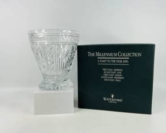 This Waterford Crystal XL Ice Bucket is from the Millennium Collection: A Toast to the Year 2000. This elegant piece complements the collection’s five commemorative toast flutes, which can be found in Lots #608, #669, and #739.