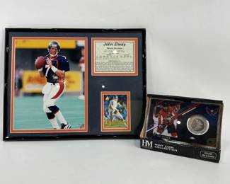 Sports Collectibles: (1) H 11" x W 14" framed John Elway collage consisting of a 8x10" photo, trading cards, and stats print, and (1) The Highland Mint NHL Washington Capitals- Alex Ovechkin Limited Edition silver plated Mint Coin.
