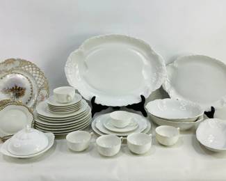 Haviland & Co. Dinnerware Collection & More: An assortment featuring serving bowls, platters, and a butter dish in the Ranson pattern; dinner plates, cups, and saucers adorned with an embossed leaf motif; scalloped-edge salad plates; and additional coordinating pieces. Shipping-NO