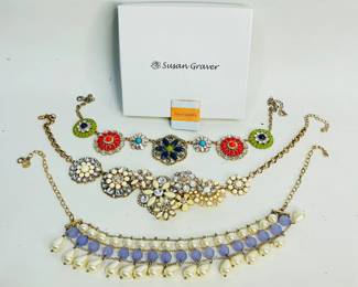 Three (3) rhinestone choker style necklaces. (1) 17" gold tone with colorful floral accents, (1) 17" gold tone with cream and clear accents, and (1) 20" with gold chain and lavender beads and faux pearl. Shipping-YES