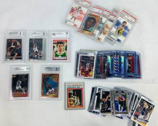 NBA Trading Cards: (10) graded trading cards by BCCG, Becket, and PSA, and (50 +/-) assorted trading cards featuring players such as Nikola Jokic, Michael Jordan, Kevin Durant, and more. Shipping-YES