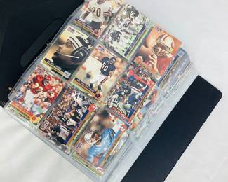 A binder of (850 +/-) assorted Pro Set NFL trading cards. Shipping-YES