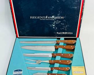Regent Cutlery Swords, stainless steel, (5) knives and one fork, kives range from 7" - 14 1/2", in original box. Shipping-YES
