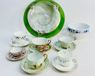 This lot includes a classic "Blue Onion" mixing bowl by Bauscher Weiden Bavaria, Germany, a lovely assortment of teacup and saucer sets from brands like Lefton, Duchess, Fred Roberts Co., and more, plus a vintage hand-painted chip and dip tray Shipping-NO