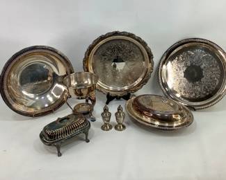 Pair of Duchin Creation weighted sterling salt and pepper shakers with glass lining, total weight 6.9 ounces, H 4" x 1 3/4" diameter. Plated butter dish with swivel lid and (2) glass dishes, H 4" x W 8" x D 5" legs are loose. (2) 12" platters and more. See photos for details. Shipping-YES