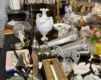 Zebras.  Brass.  Statues.  Pillows.  Treasures.