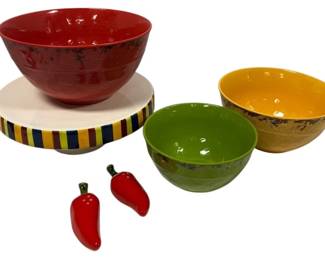 Serving Dishes In Red, Yellow, And Green With Chili Salt And Pepper Shakers