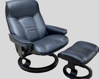 Black leather Ekornes Stressless “Senator” recliner with ottoman