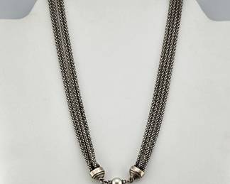 Sterling four strand necklace with natural pearl clasp