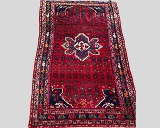 Colorful wool Persian rug; 60” x 118”.