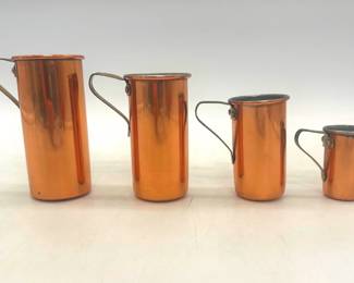 Copper graduated measuring cups