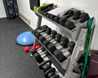 Weight Rack with Dumbbells, Kettlebells, and Accessories
Complete home gym weight set in excellent condition. Includes a sturdy three-tier rack with hex dumbbells up to 25 lbs, kettlebells, resistance bands, and additional light weights. Also features a BOSU balance trainer, medicine ball rack, and yoga mat. A perfect all-in-one setup for strength training and functional fitness.