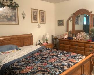 Queen bed with mattress and boxspring the set comes with a dresser, chest of drawers and nightstand