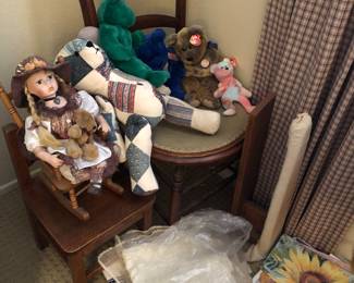 Antique wooden chairs and some dolls